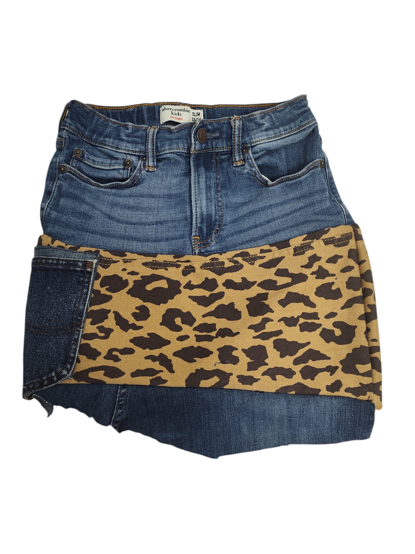 A denim mini skirt featuring a leopard print panel across the front, photographed flat against a white background.